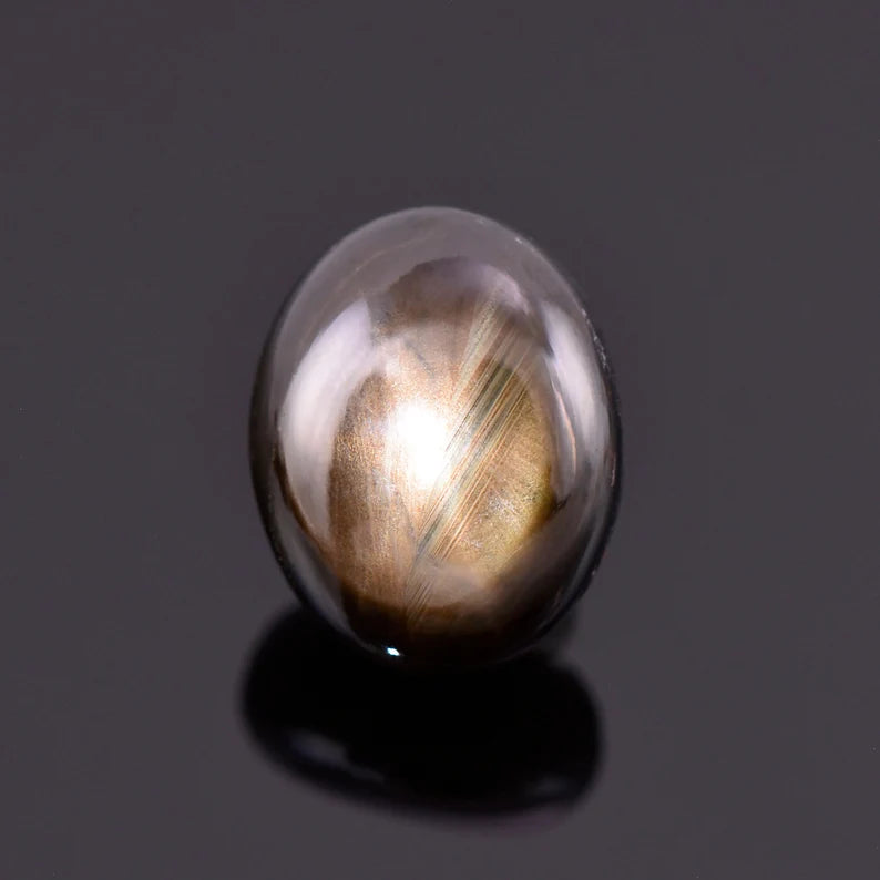 Star Sapphire, 6.85 cts., 11.8x9.4 mm., Oval Cabochon, Black, Thailand