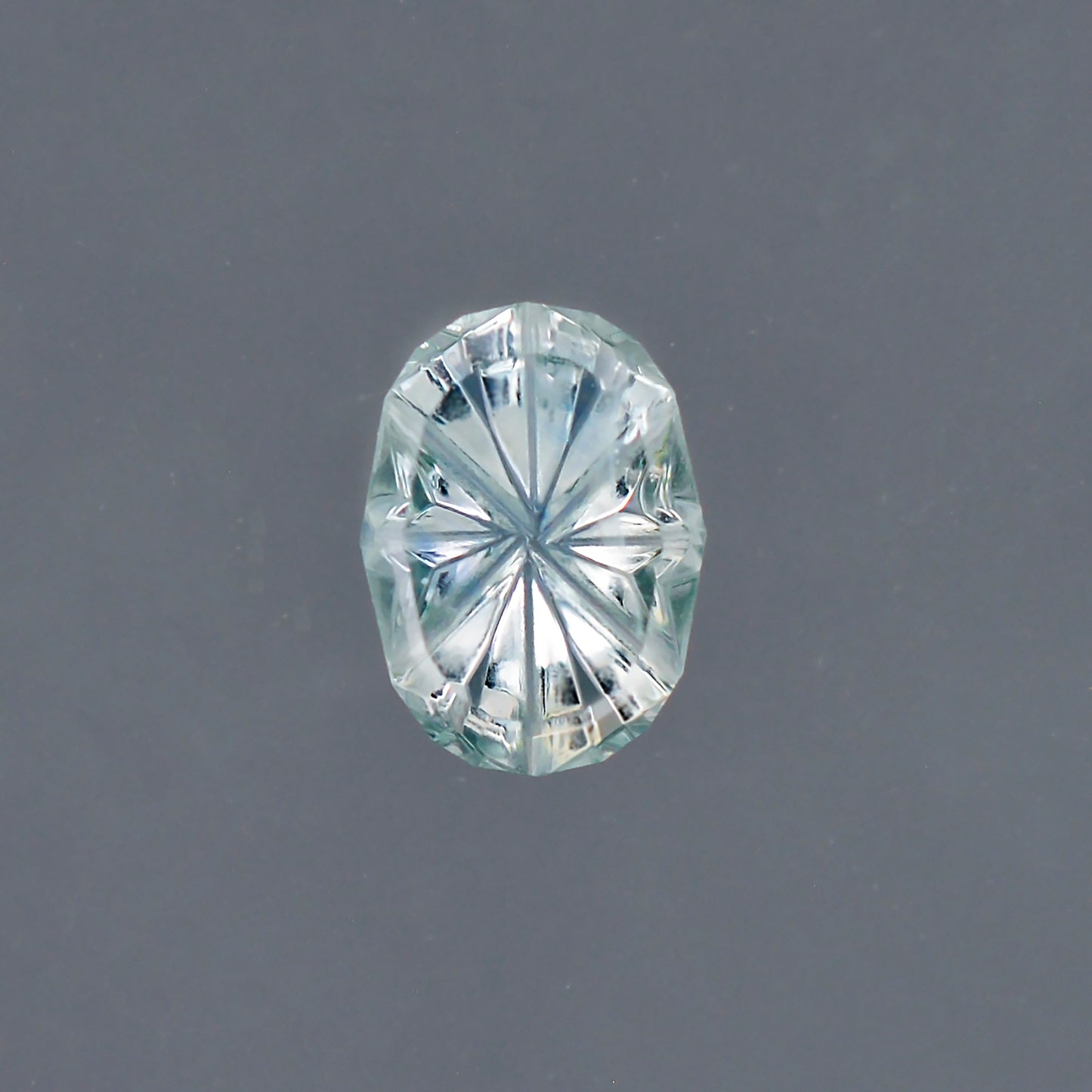 Sapphire, 0.55 cts., 6.6x4.8 mm., Oval Fantasy, Silver, Blue, Montana, Natural