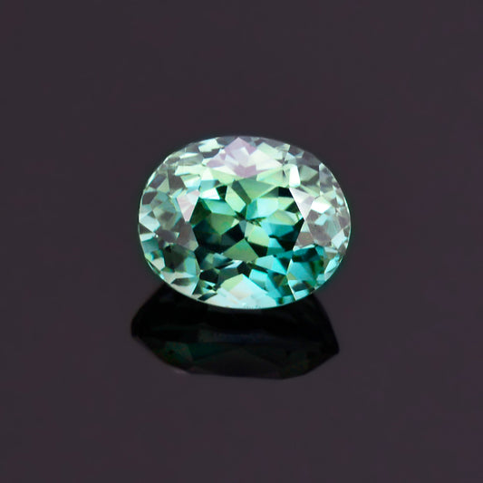 Sapphire, 1.51 cts., 6.7x5.5 mm., Oval, Bicolor, Teal, Blue, Green, Madagascar, Natural, GIA Cert.