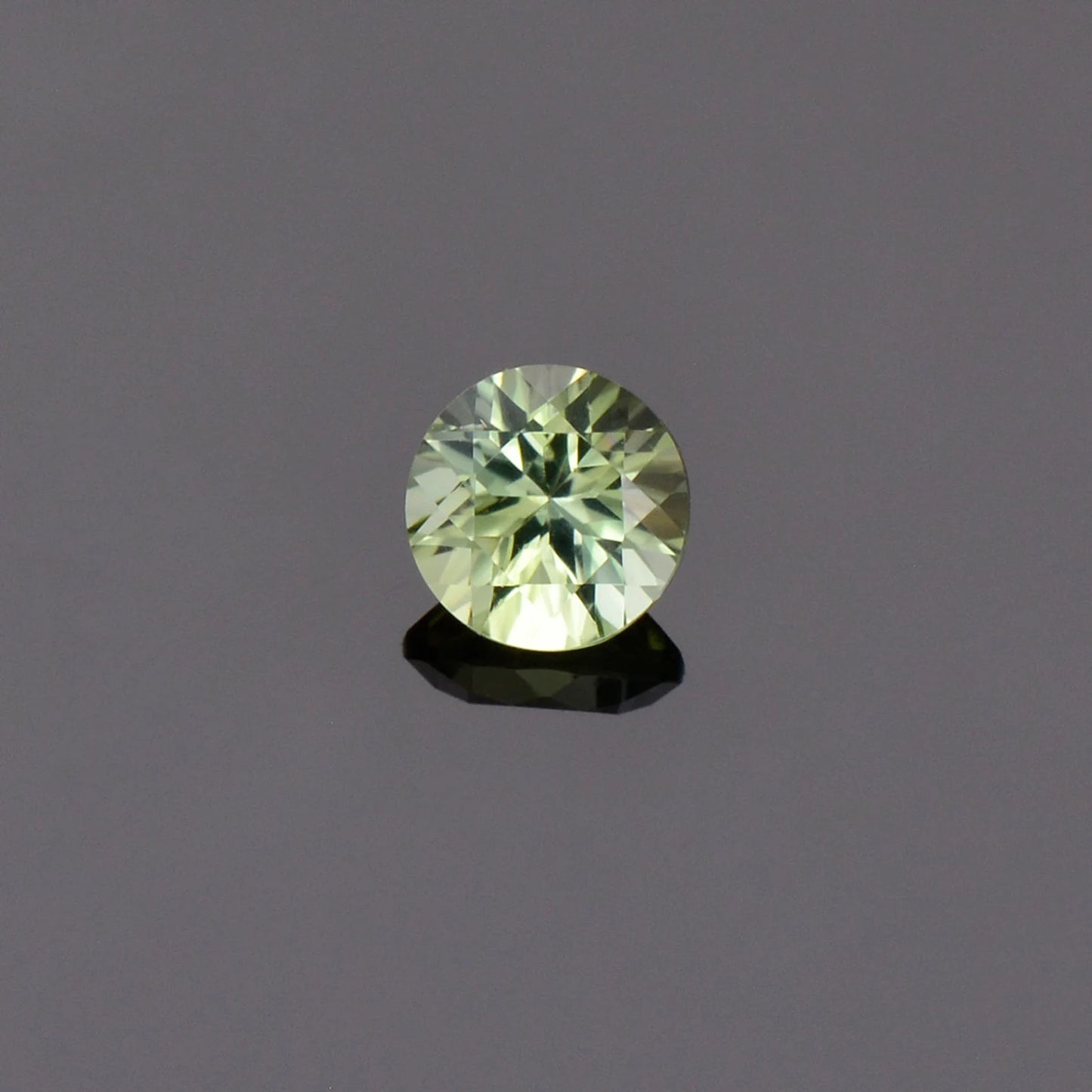 Bright Yellow Green Sapphire from Australia, 0.50 cts., 5 mm., Round Brilliant Cut