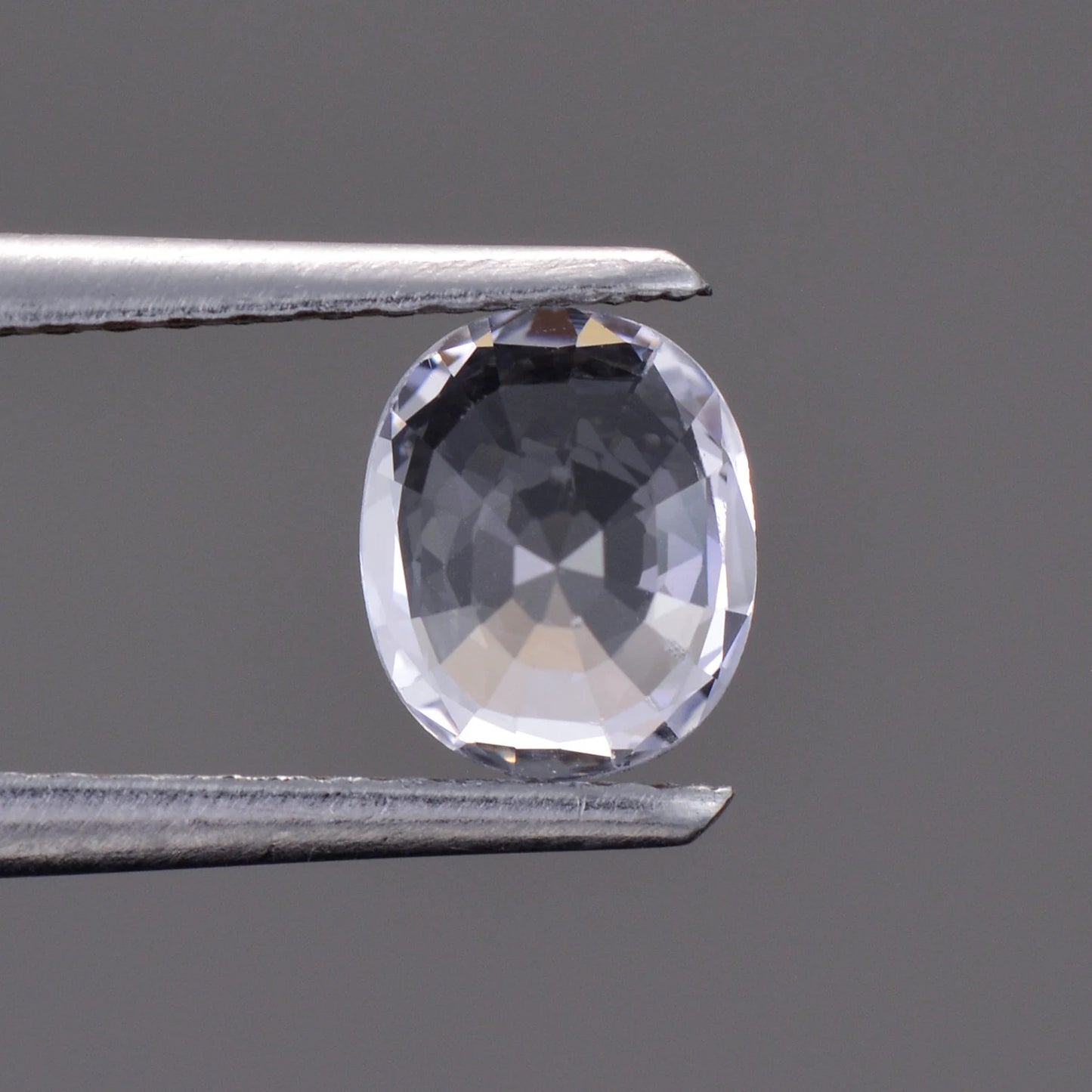 Brilliant White Sapphire Gemstone from Sri Lanka, 0.87 cts., 6.4 x 5.3 mm., Oval Shape.