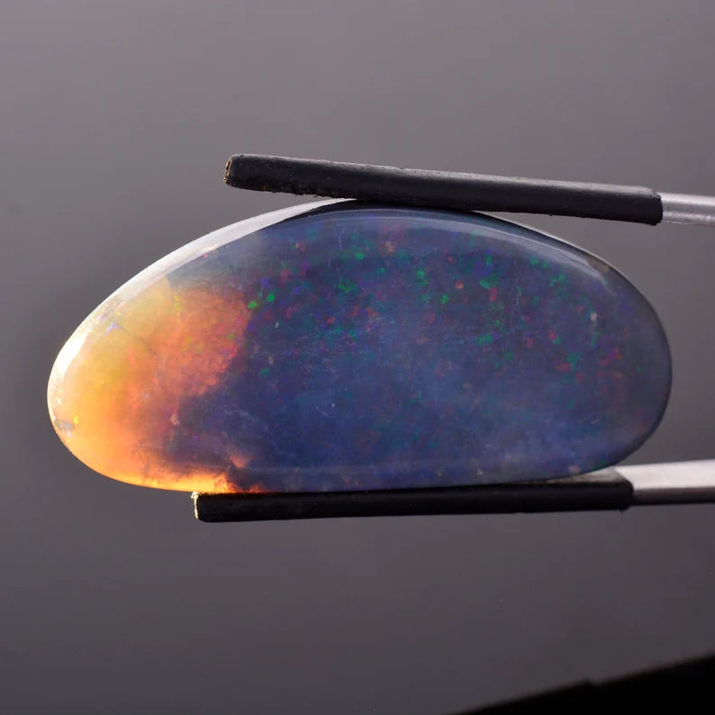 Fabulous Lightning Ridge Semi Black Opal from Australia, 32.44 cts., 41x19 mm., Freeform Cabochon