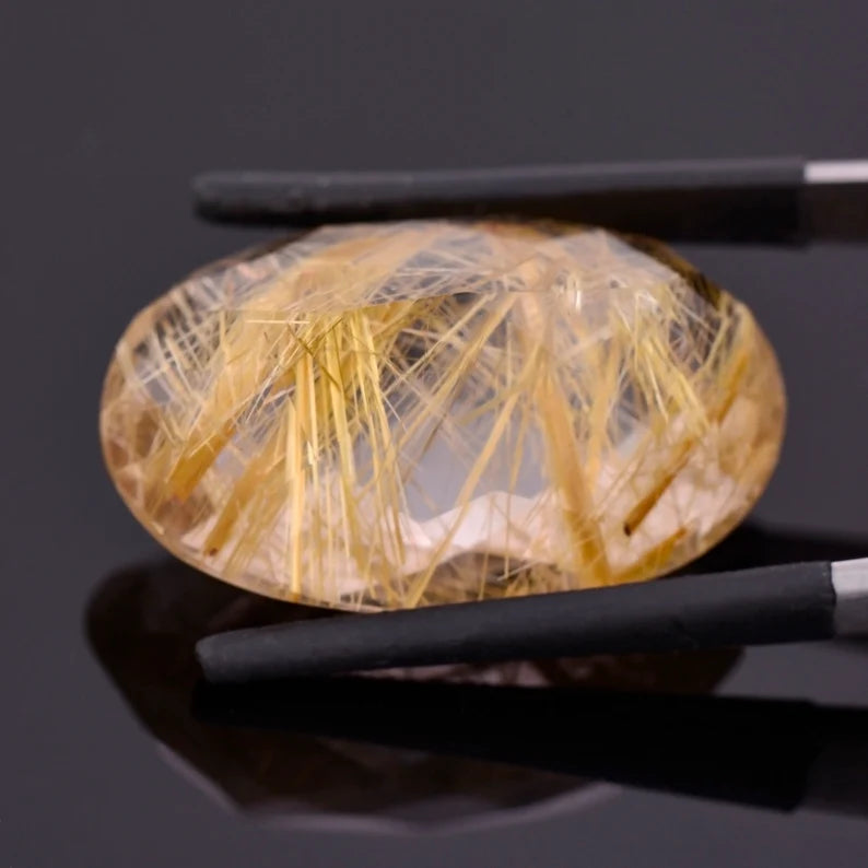 Excellent Quartz with Rutile Inclusion Gemstone from Brazil, 55.77 cts., 32x21 mm., Oval Shape