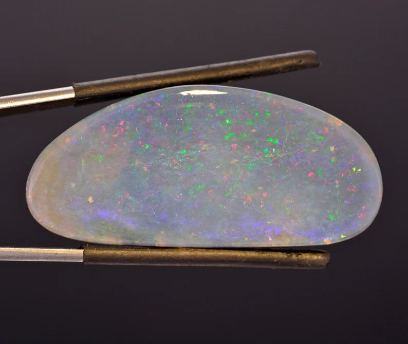 Fabulous Lightning Ridge Semi Black Opal from Australia, 32.44 cts., 41x19 mm., Freeform Cabochon