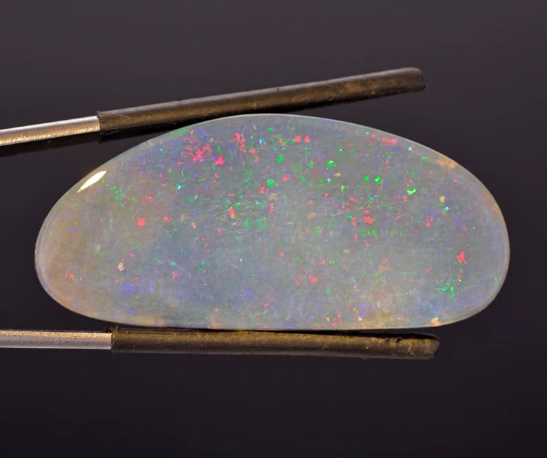 Fabulous Lightning Ridge Semi Black Opal from Australia, 32.44 cts., 41x19 mm., Freeform Cabochon