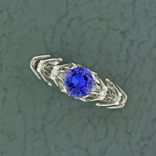 Unique Architectural Engagement Style Tanzanite and Diamond Ring in 14kt White Gold