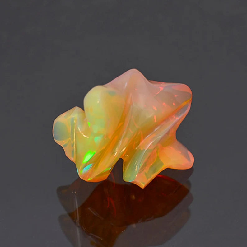 Superb Hand Carved Orange Opal from Ethiopia 12.46 cts.