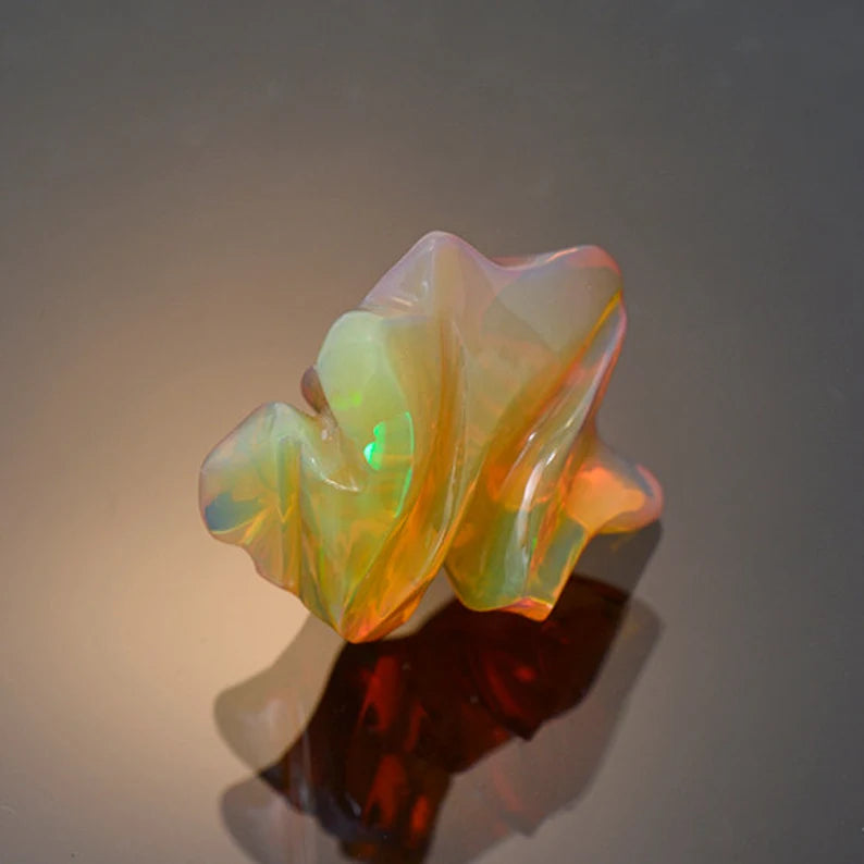 Superb Hand Carved Orange Opal from Ethiopia 12.46 cts.