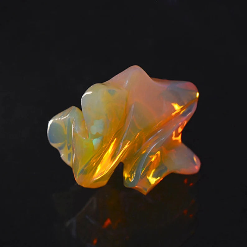 Superb Hand Carved Orange Opal from Ethiopia 12.46 cts.