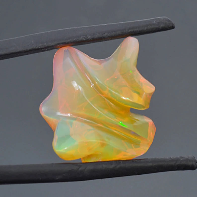 Superb Hand Carved Orange Opal from Ethiopia 12.46 cts.