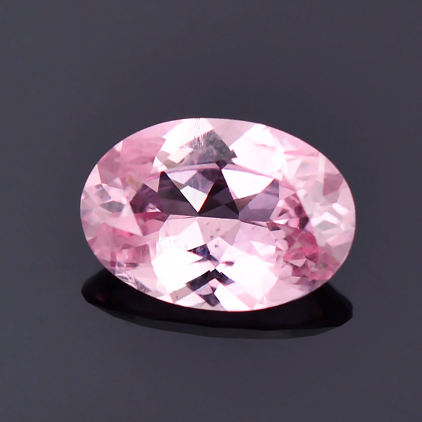 Dragon Garnet, 0.74 cts., 7.1x4.9 mm., Oval, Pink, Tanzania, Natural