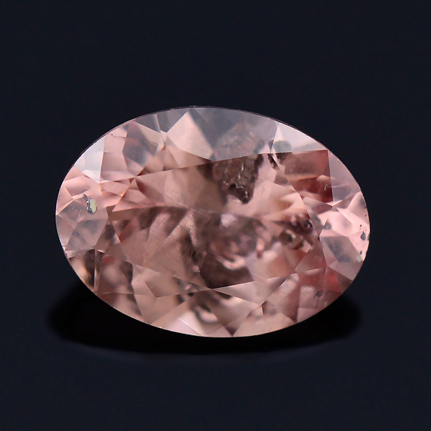 Dragon Garnet, 0.75 cts., 6.5 x 4.8 mm., Oval, Peach, Tanzania, Natural