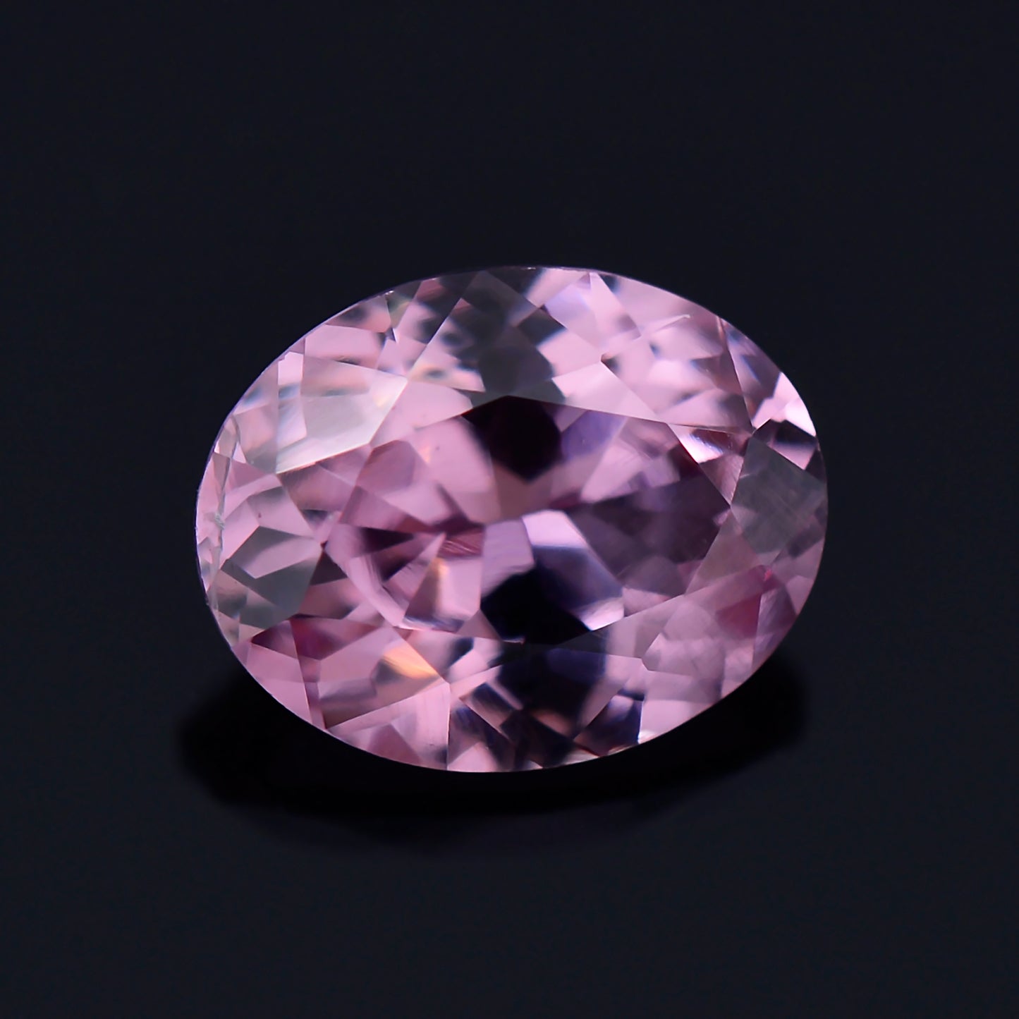 Dragon Garnet, 0.75 cts., 6.2 x 4.9 mm., Oval, Pink, Tanzania, Natural