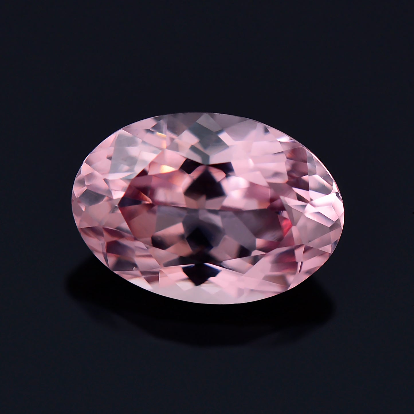 Dragon Garnet, 0.99 cts., 7.0 x 4.9 mm., Oval, Pink, Tanzania, Natural