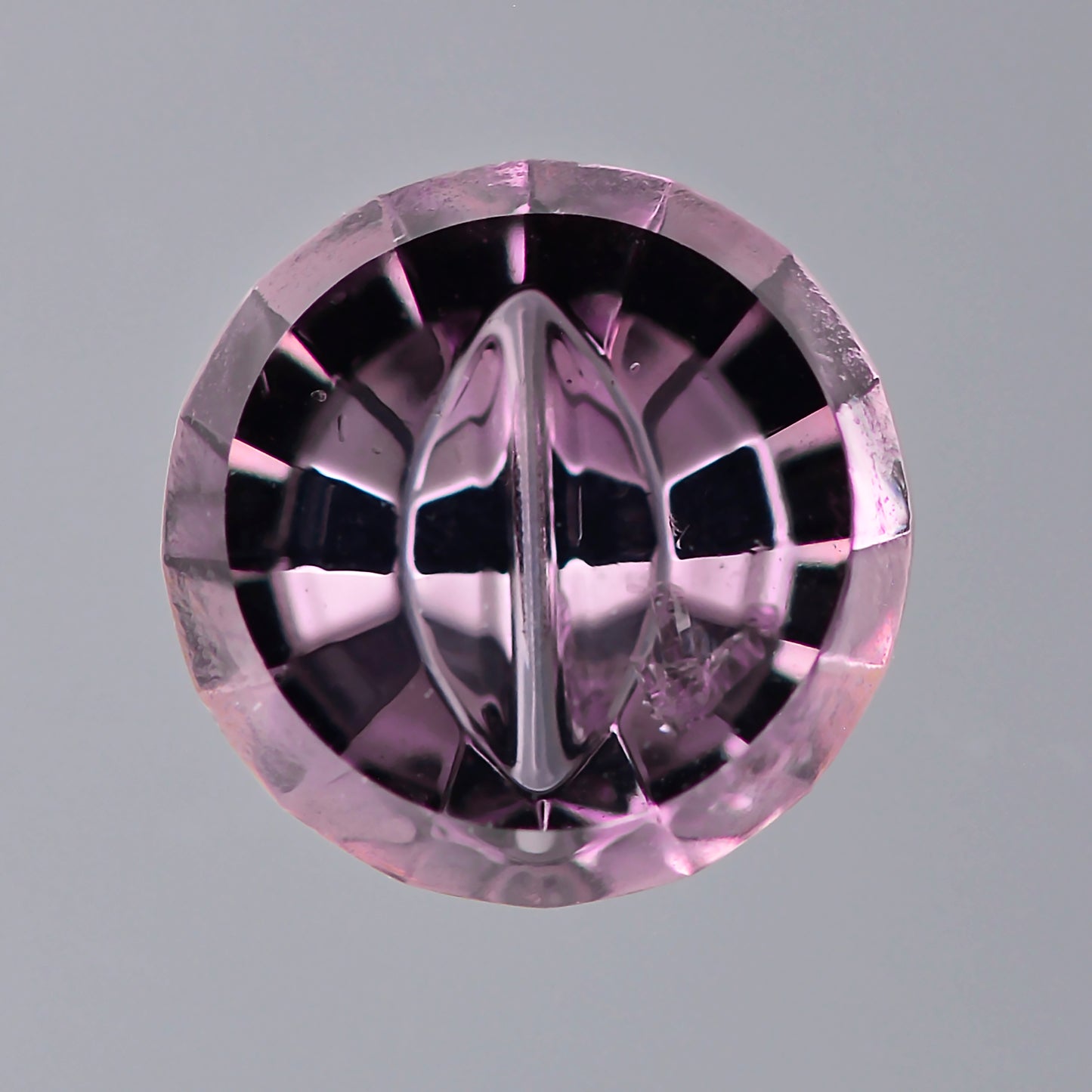 Dragon Sapphire, 0.64 cts., 5.6 x 2.4 mm, Fantasy Dragon Eye Round, Purple, Tanzania, Natural