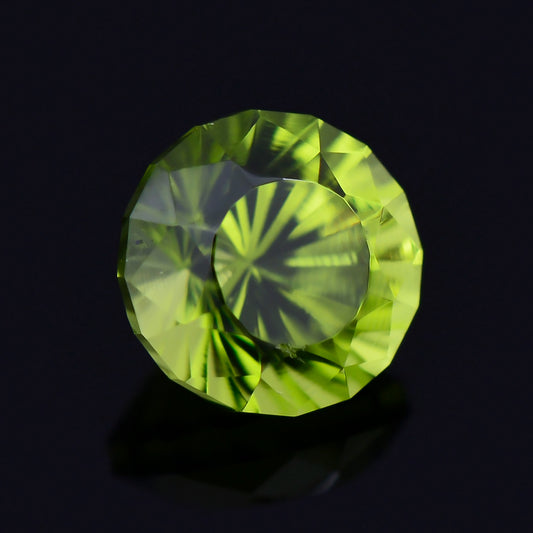 Peridot, 0.87 cts., 5.4 mm, Concave Round, Green, Arizona, Natural