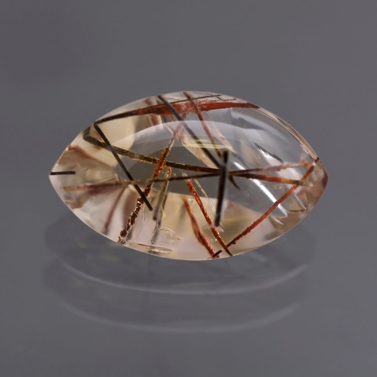 Quart with Rutile, 28.75 cts., 27x16 mm, Fantasy Marquise, Colorless, Red, Brazil, Natural