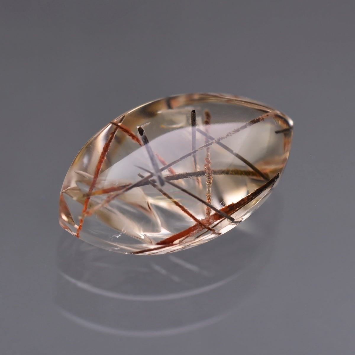 Quart with Rutile, 28.75 cts., 27x16 mm, Fantasy Marquise, Colorless, Red, Brazil, Natural