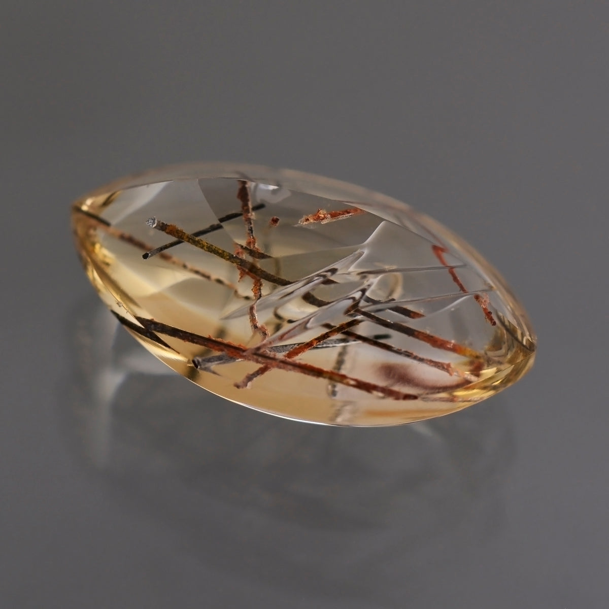 Quart with Rutile, 28.75 cts., 27x16 mm, Fantasy Marquise, Colorless, Red, Brazil, Natural