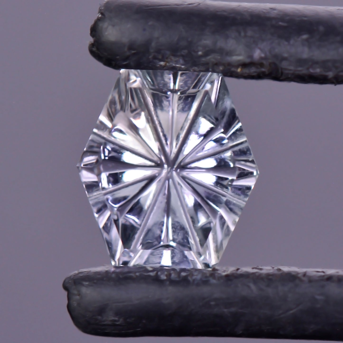 Sapphire, 0.82 cts., 5.9x5.4 mm., Hexagon Fantasy, Silver, Purple, Montana