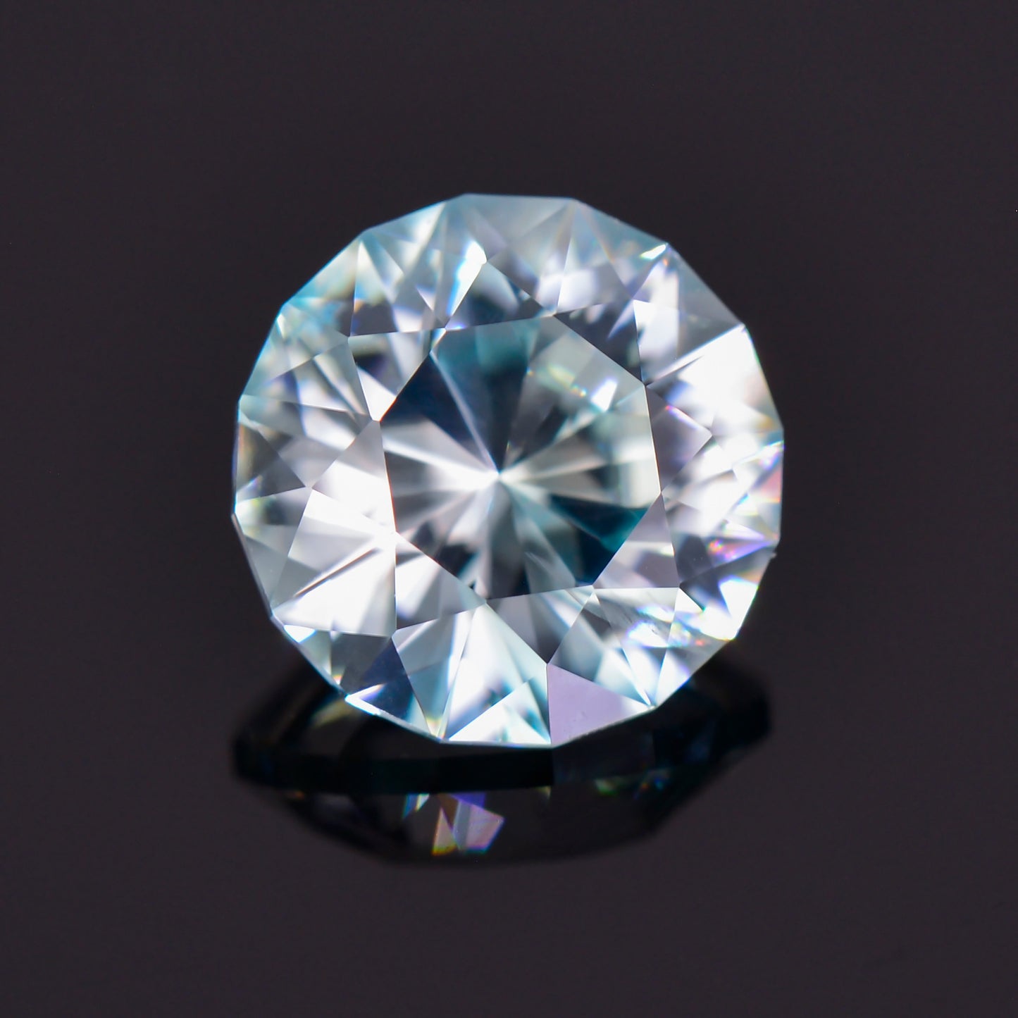 Zircon, 4.15 cts., 9.0 mm., Round, Blue, Colorless, Multi Color, Cambodia