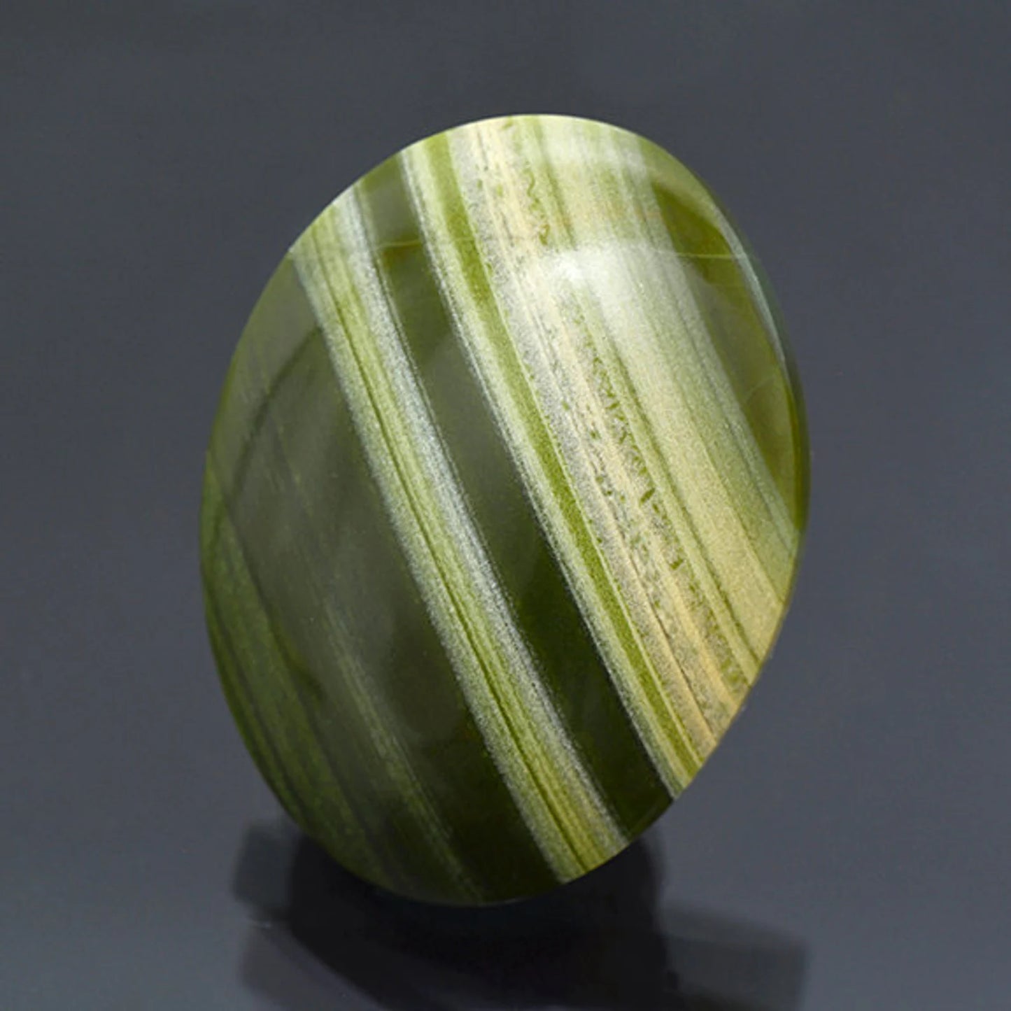 Fine Green Banded Ricolite Cabochon from New Mexico 55.97 cts.