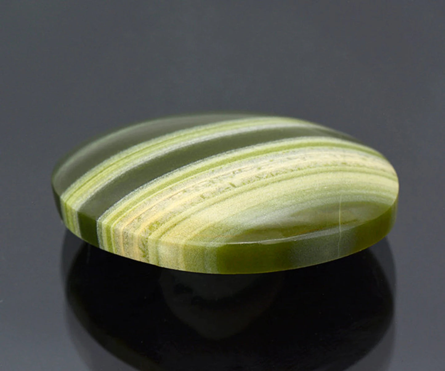 Fine Green Banded Ricolite Cabochon from New Mexico 55.97 cts.