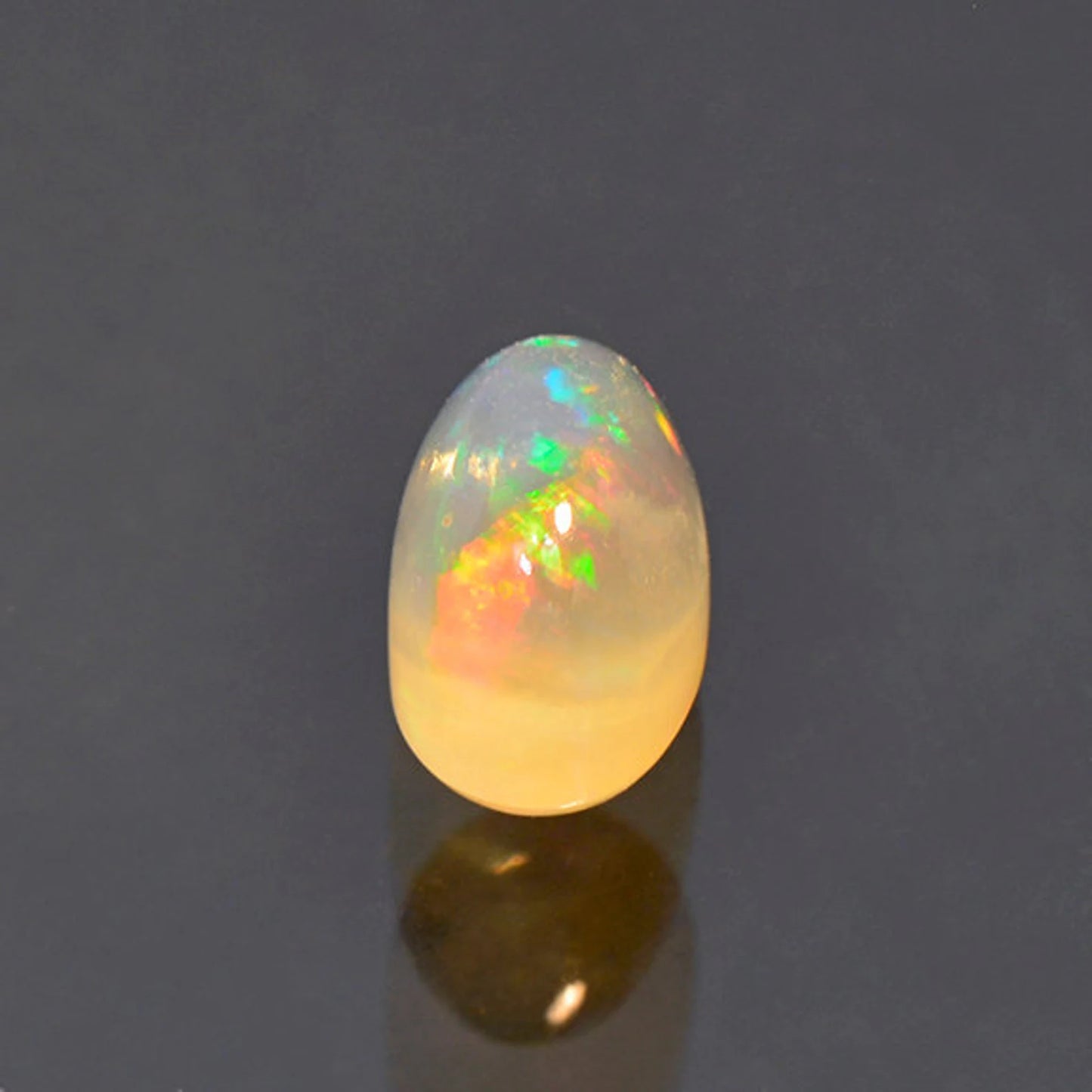 Fantastic Fire Opal Cabochon with Multi Color Flash from Mexico 2.46 cts.