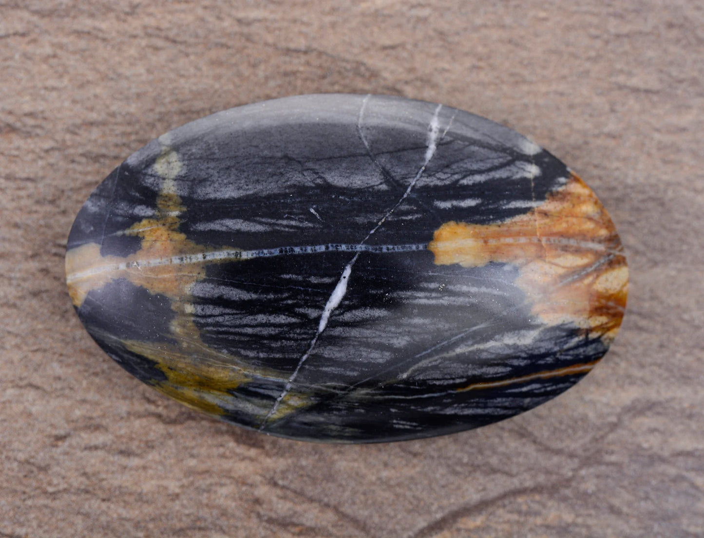 Interesting Brecciated Picasso Jasper from Utah, 81.68 cts., 47 x 29 mm., Oval Cabochon