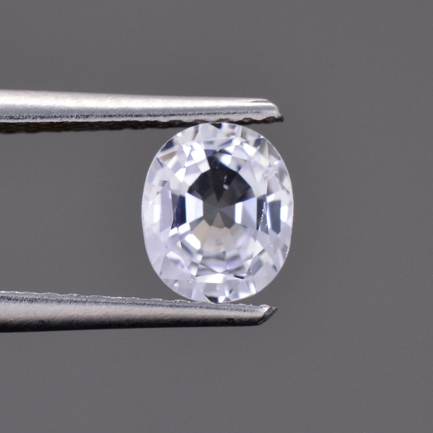 Brilliant White Sapphire Gemstone from Sri Lanka, 0.87 cts., 6.4 x 5.3 mm., Oval Shape.