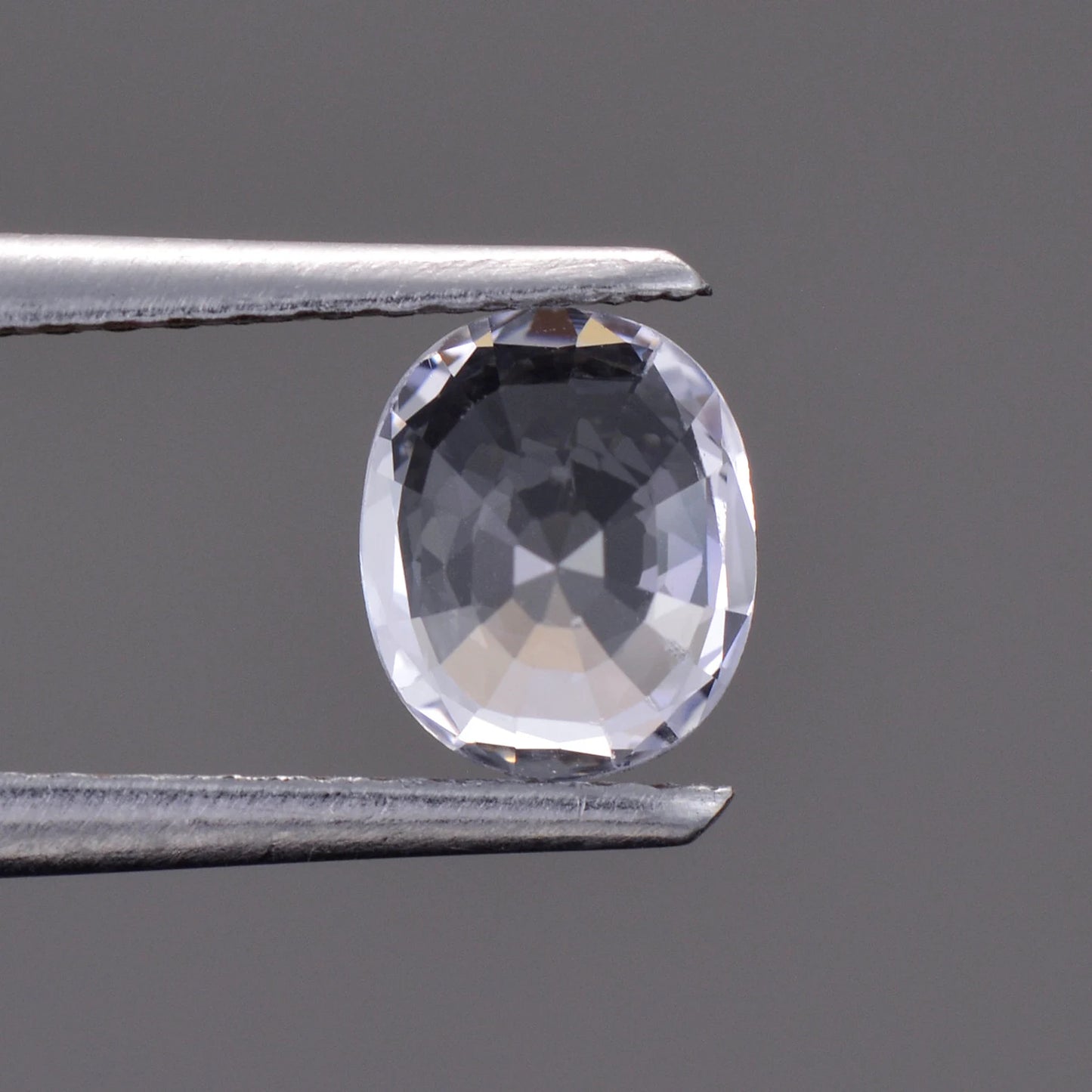 Brilliant White Sapphire Gemstone from Sri Lanka, 0.87 cts., 6.4 x 5.3 mm., Oval Shape.