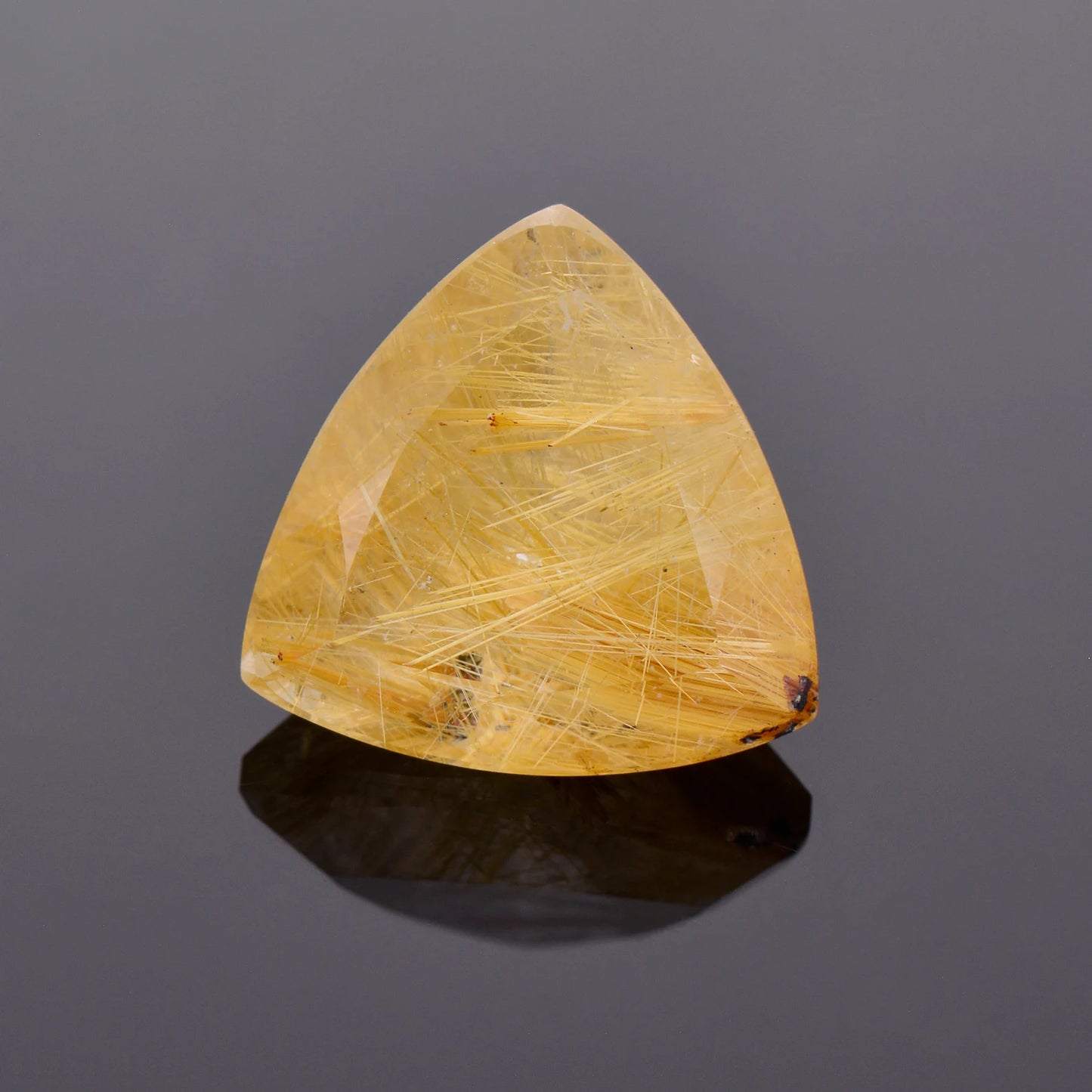 Intriguing Quartz with Rutile Inclusion Gemstone from Brazil, 12.13 cts., 16 mm., Trillion Shape