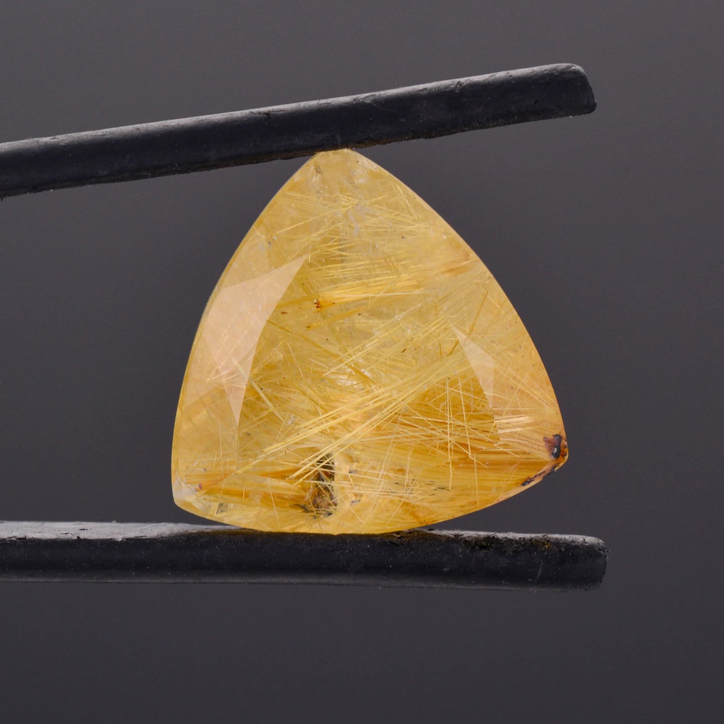 Intriguing Quartz with Rutile Inclusion Gemstone from Brazil, 12.13 cts., 16 mm., Trillion Shape