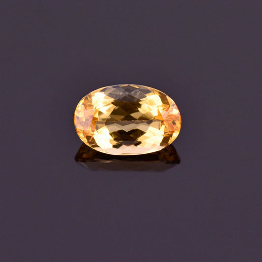 Beautiful Bright Yellow Orange Imperial Topaz Gemstone, 1.35 cts., 8.3x5.5 mm., Oval Shape