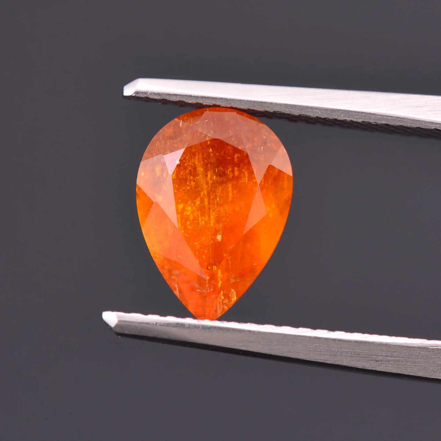 Rare Bright Orange Clinohumite Gemstone from Tajikistan, 2.47 cts., 10x7 mm., Pear Shape