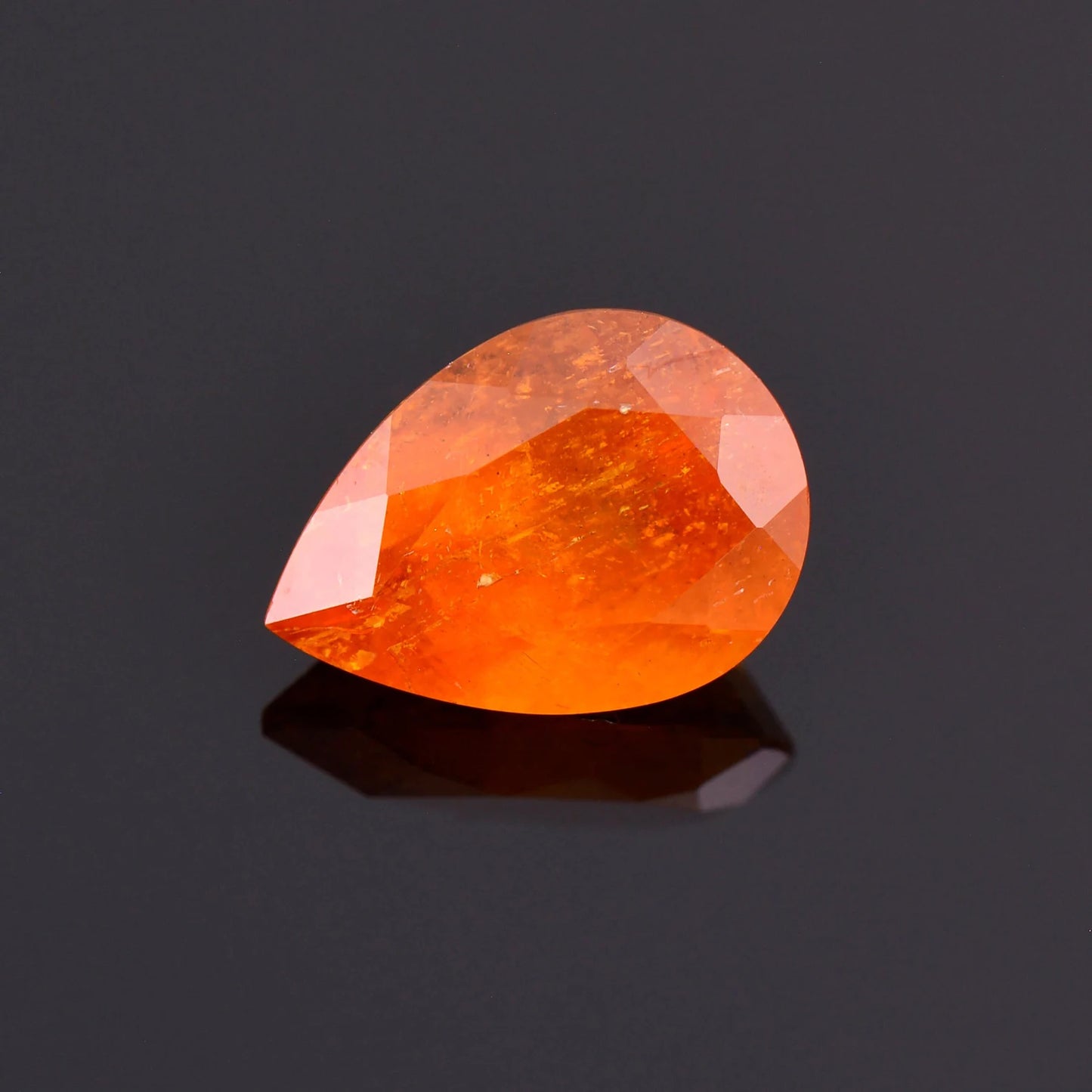 Rare Bright Orange Clinohumite Gemstone from Tajikistan, 2.47 cts., 10x7 mm., Pear Shape