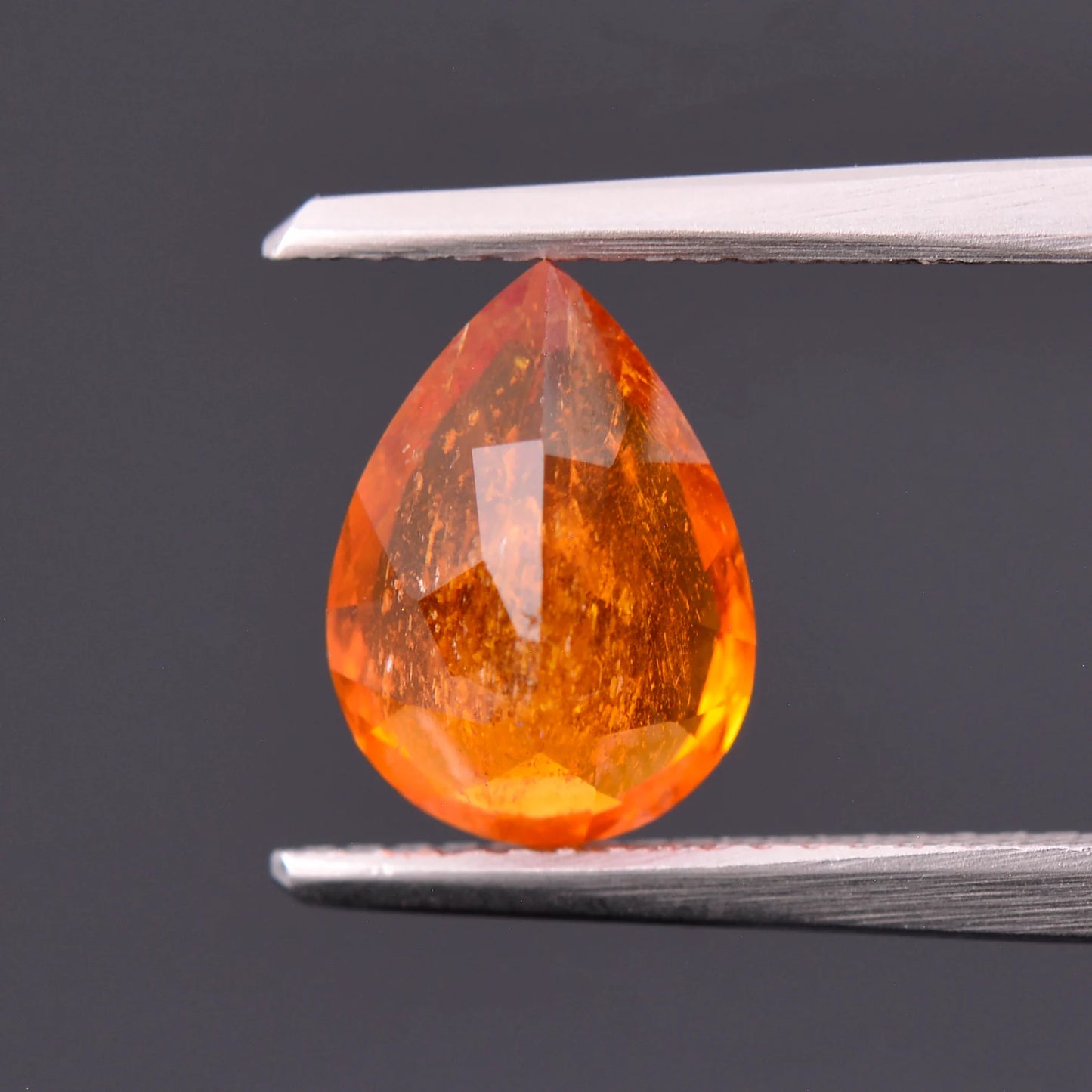 Rare Bright Orange Clinohumite Gemstone from Tajikistan, 2.47 cts., 10x7 mm., Pear Shape