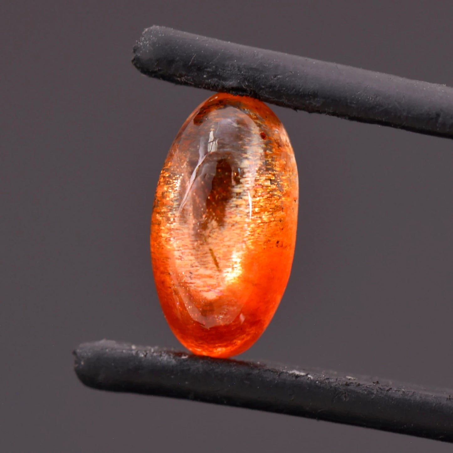 Gorgeous Orange Sunstone with Hematite Inclusions from India, 2.60 cts., 11x6 mm., Oval Cabochon