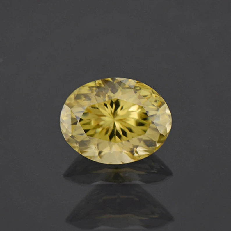 Glitter Pastel Yellow Green Zircon Gemstone from Sri Lanka 4.12 cts., 10x8 mm., Oval Shape