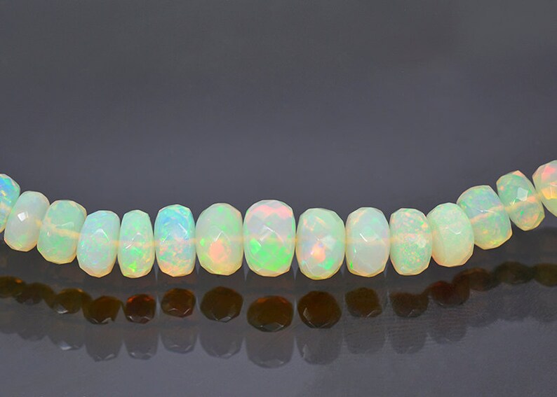 Excellent Faceted Opal Bead Necklace with 14 kt Yellow Gold Clasp 68.0 cts.