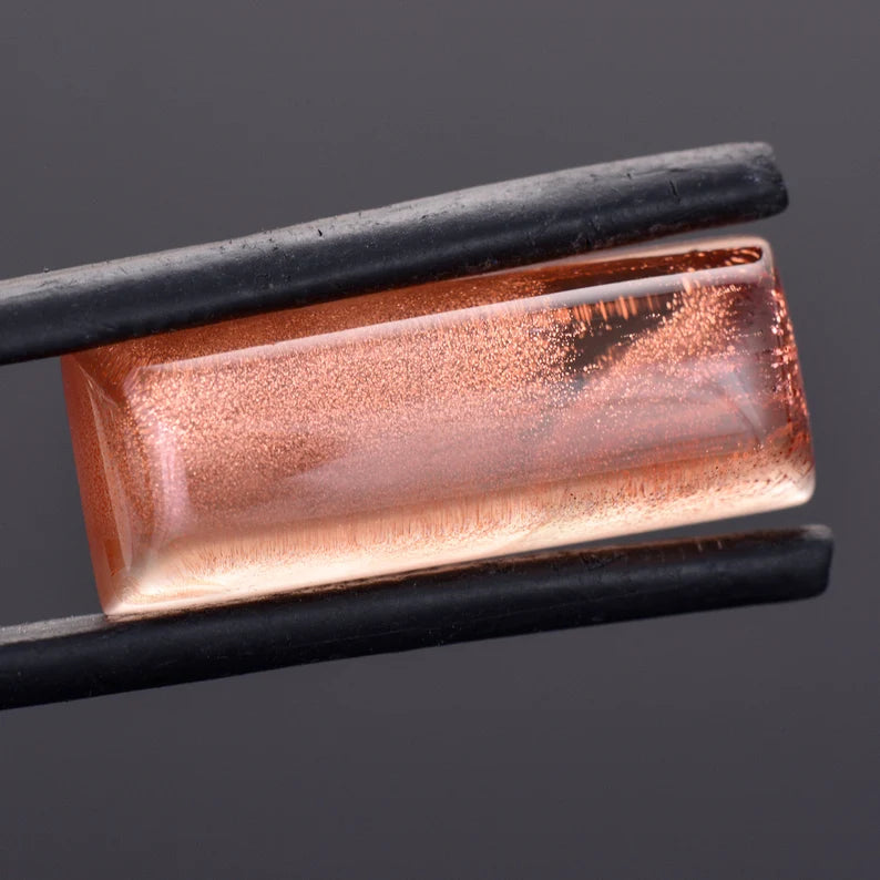 Exceptional Copper Shiller Sunstone Cabochon Gem, 10.58 cts., 21 x 8 mm., Elongated Sugar Loaf Shape