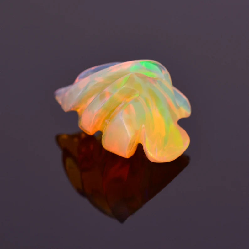 Lovely Hand Carved Orange Opal from Ethiopia 4.23 cts