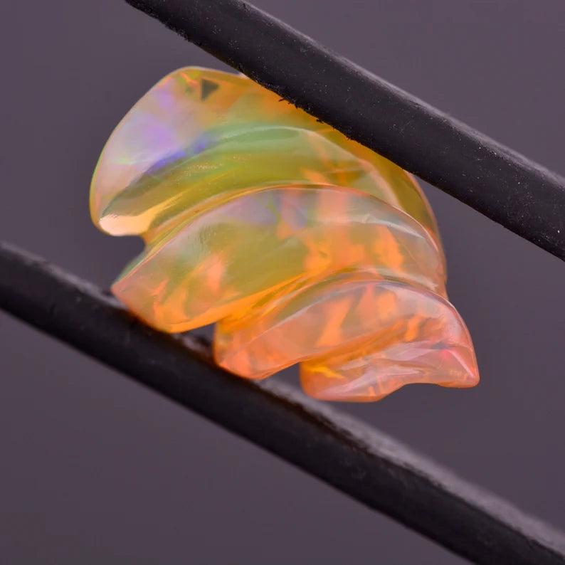 Lovely Hand Carved Orange Opal from Ethiopia 4.23 cts