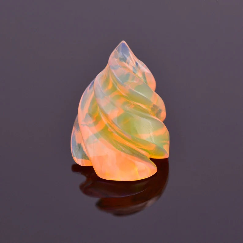 Lovely Hand Carved Orange Opal from Ethiopia 4.23 cts