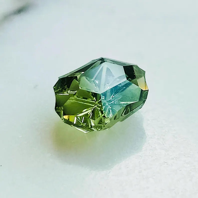 Excellent Green Tourmaline Gemstone, 1.43 cts., 8x6 mm., Fantasy Carved Baroque Rupee Shape