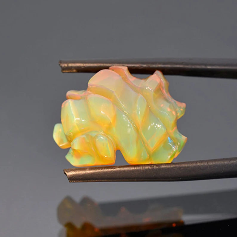 Top Notch Hand Carved Orange Opal from Ethiopia 11.28 cts