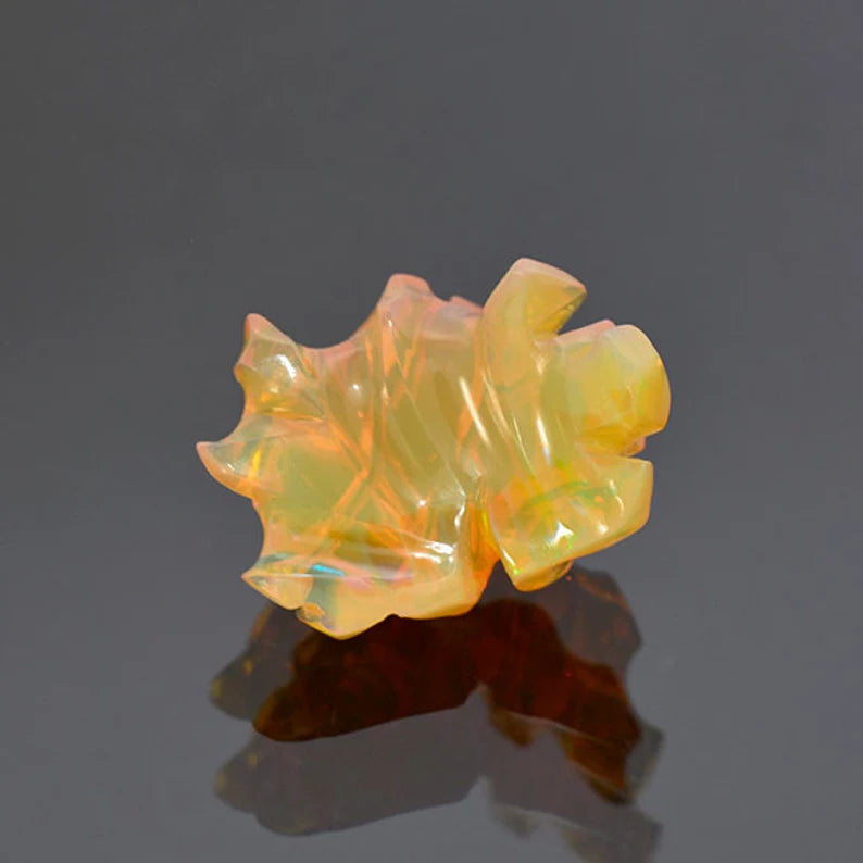 Top Notch Hand Carved Orange Opal from Ethiopia 11.28 cts