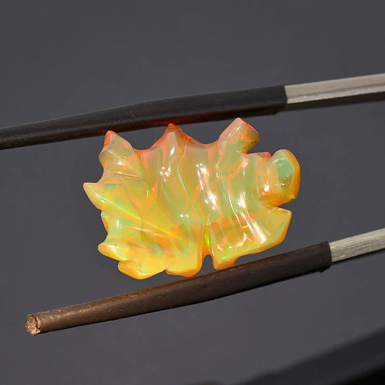 Top Notch Hand Carved Orange Opal from Ethiopia 11.28 cts