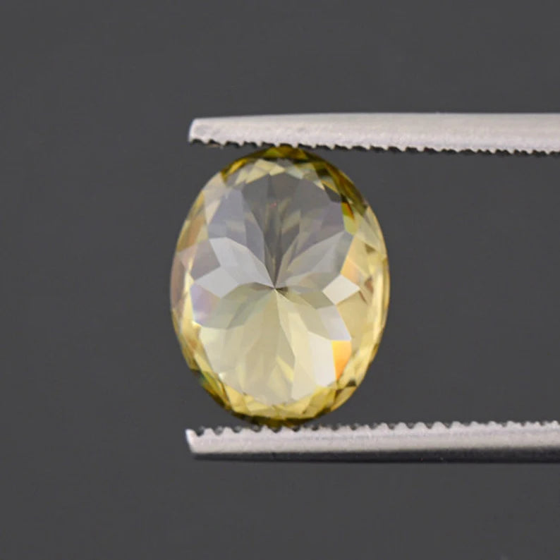 Glitter Pastel Yellow Green Zircon Gemstone from Sri Lanka 4.12 cts., 10x8 mm., Oval Shape